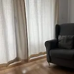 Acogedor En *